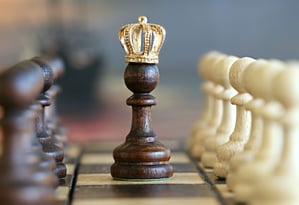 Crowned Chess Pawn Symbolizing the Importance of a Customer Success Strategy